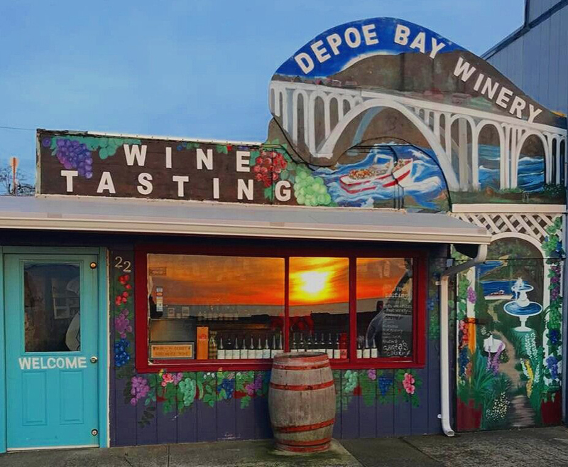 Depoe Bay Winery store front view with sunset