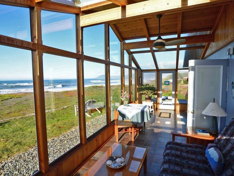 Oceanfront views from sunroom at Lands End, Gold Beach rental home.