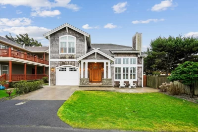 Luxury Tolovana Park beach home with rock fireplace, gourmet kitchen, and firepit just steps from Cannon Beach