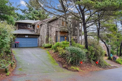 Pacific Vista Cannon Beach vacation home nestled in trees with ocean views near Haystack Rock