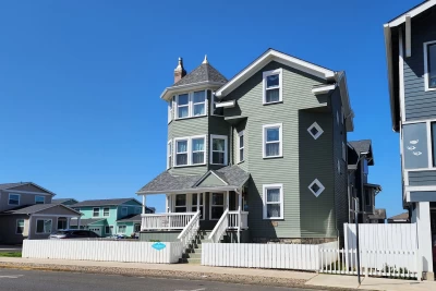 Beautiful green three story house